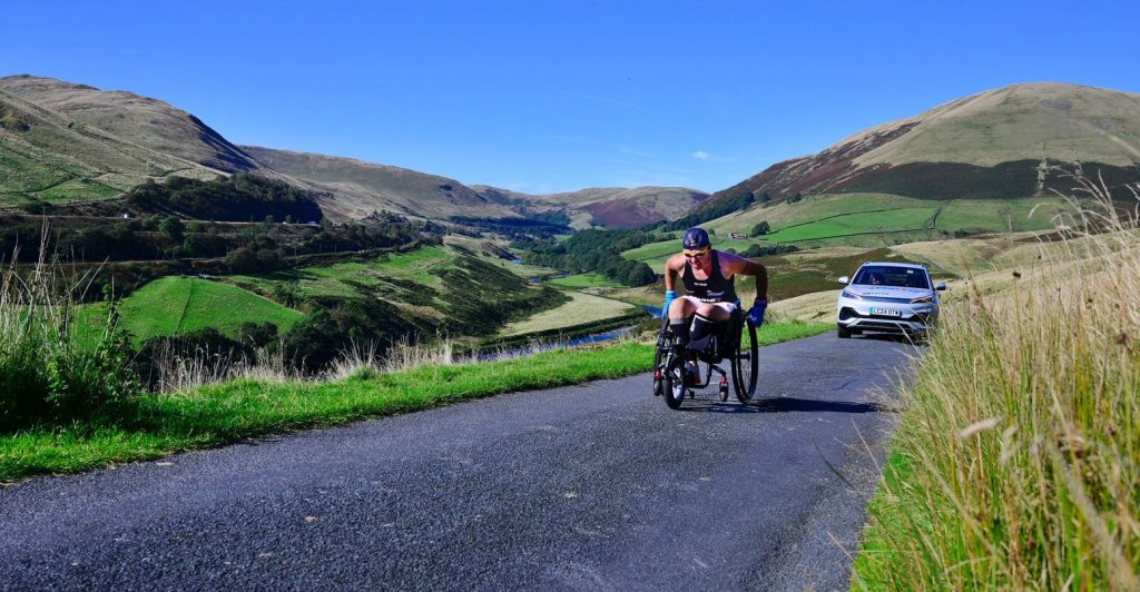 Amputee ex-NHS nurse Lexi Chambers sets a record as the first person to travel from John O'Groats to Land's End in a wheelchair, conquering 874 miles in 45 days.