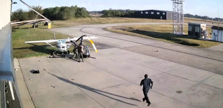 Pilot miraculously survives intense helicopter crash at Texas airport during training. Captured on CCTV, the shocking footage shows the Robinson R44 colliding mid-landing.