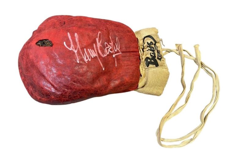 Muhammad Ali's iconic glove from his legendary 1963 fight against Henry Cooper is up for auction, expected to sell for £6 million. Discover the history behind this boxing relic!