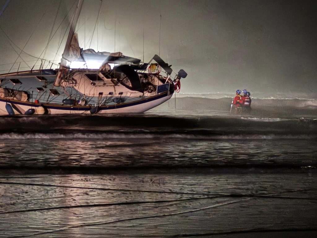 A yacht ran aground on Cornwall's Polzeath beach after the skipper reportedly took a “wrong turn,” sparking a coastguard rescue and drawing curious onlookers to the scene.