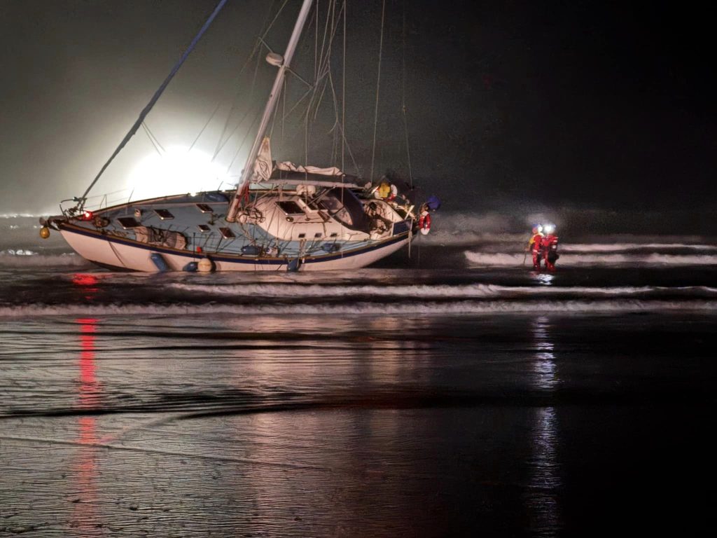 A yacht ran aground on Cornwall's Polzeath beach after the skipper reportedly took a “wrong turn,” sparking a coastguard rescue and drawing curious onlookers to the scene.