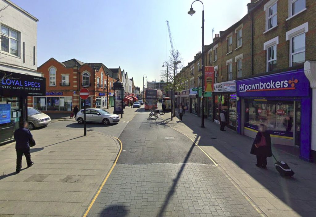 Two men engaged in a terrifying machete fight on East Ham High Street, shocking shoppers, including children, and halting traffic as witnesses captured the chaotic scene.