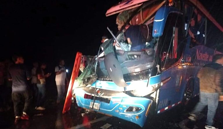 Over 20 injured as two buses collide on a wet Colombian road, sending one into a wooded area. Investigations reveal harsh weather and possible speeding. Read more!