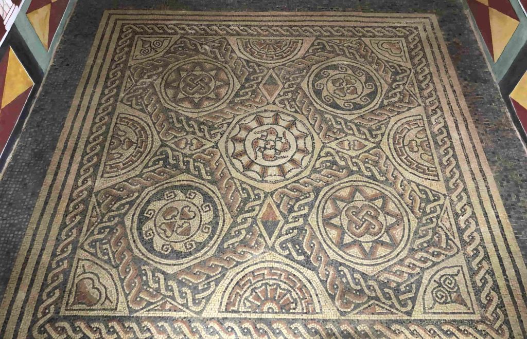 Discover how 140,000 hand-crafted stone cubes, authentic tools, and untrained volunteers brought a stunning Roman mosaic back to life in Somerset after five years of work!