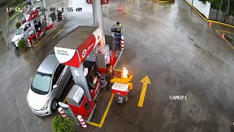 A motorcyclist's fuel stop turns into chaos as sparks ignite a fiery blaze at a petrol station in Honduras. See how quick actions saved the day in this dramatic incident!