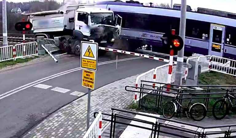 CCTV captures a dramatic train crash in Poland after a lorry gets stuck on tracks. Seven injured, £2.3M damage, 120 delayed trains—see the shocking details unfold.