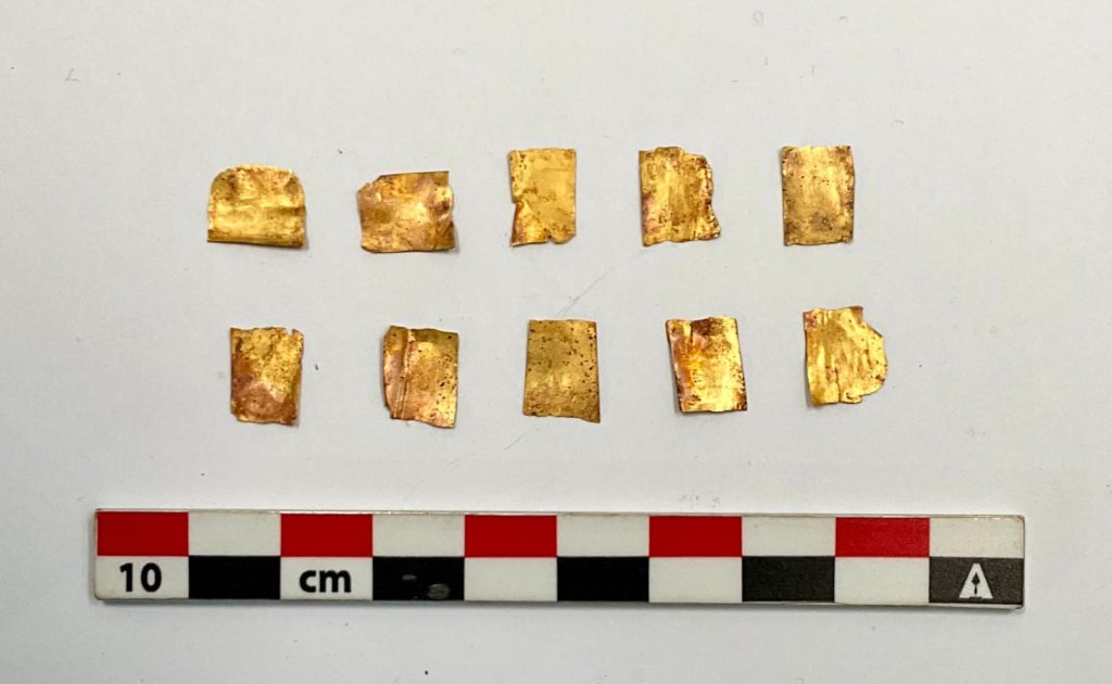 Archaeologists uncover golden tongues, nails, and ancient deities’ artifacts in an Egyptian tomb, revealing secrets of Ptolemaic-era rituals and the quest for the afterlife.