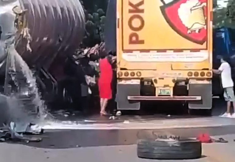 Chaotic scenes unfolded in Bolivia as looters ransacked a beer-laden lorry after a crash spilled petrol, risking a fire. Authorities now investigate the bizarre incident.