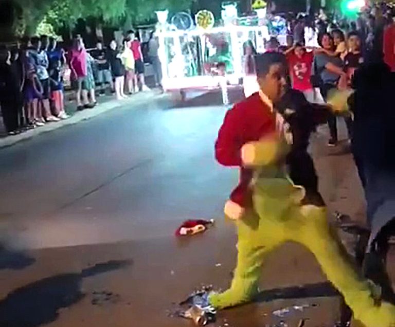 A Chilean cop dressed as the Grinch punches a man during a Christmas parade, shocking onlookers. Caught on camera, the clash sparks outrage at the family event.