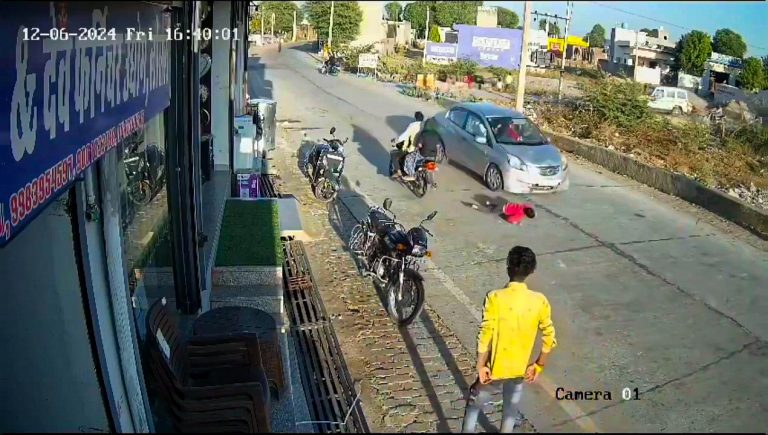 A 7-year-old boy chasing a kite was struck by a car in Sikar City, India, suffering serious injuries. Shocking CCTV footage reveals the dramatic accident and aftermath.