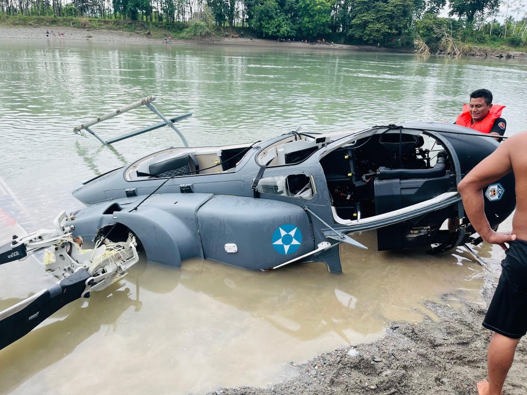 Tragic helicopter crash in Guatemala claims two lives after hitting power lines. Shocking footage captures the moment before the Bell 407 plunges into the Chixoy River.