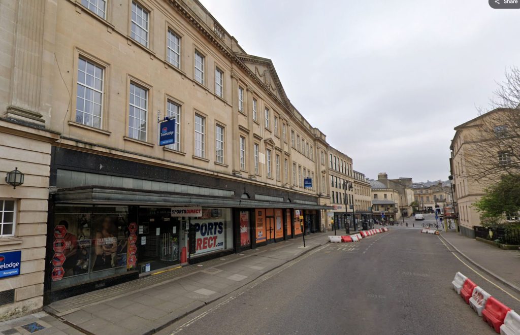 Shoppers watched in shock as a car smashed into a Sports Direct in Bath before crashing into a bus. Police and paramedics rushed to the scene—here’s what happened.