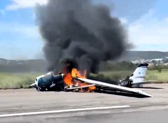 Two pilots escaped disaster after their Cessna 172 caught fire mid-flight, forcing an emergency landing before flames completely destroyed the aircraft.