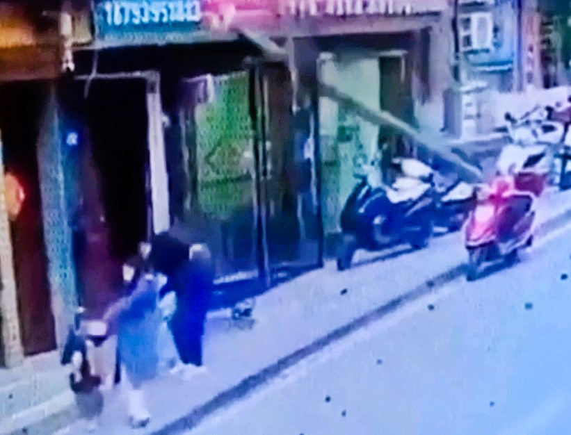 A man was left in a coma after a falling utility pole struck his head in front of his family in China. Shocking footage captures the moment disaster struck.