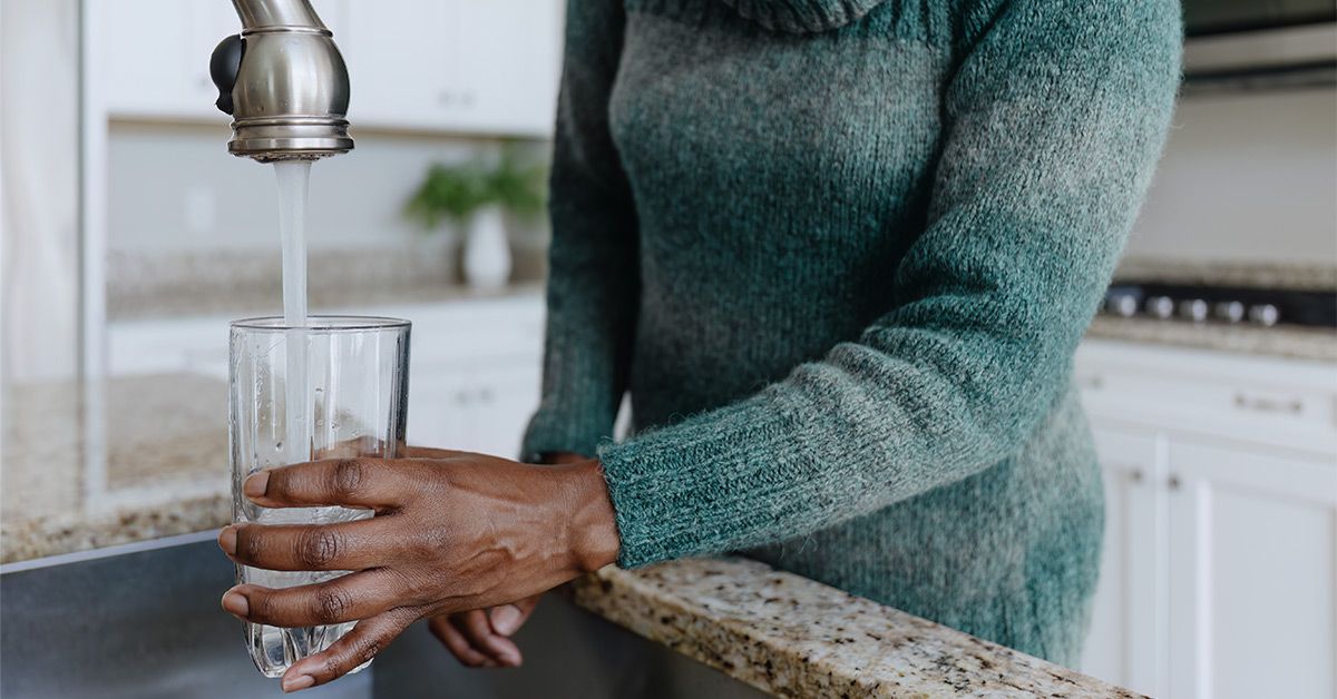 female cup tap water 1200x628 facebook