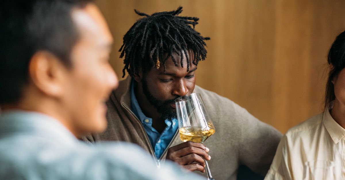 male drinking wine 1200x628 facebook