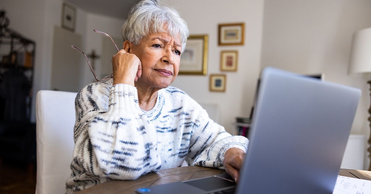 older female laptop upset 1200x628 facebook