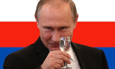 putin toasts front russian flag