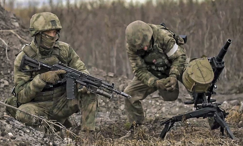 two russian soldiers preparing fire