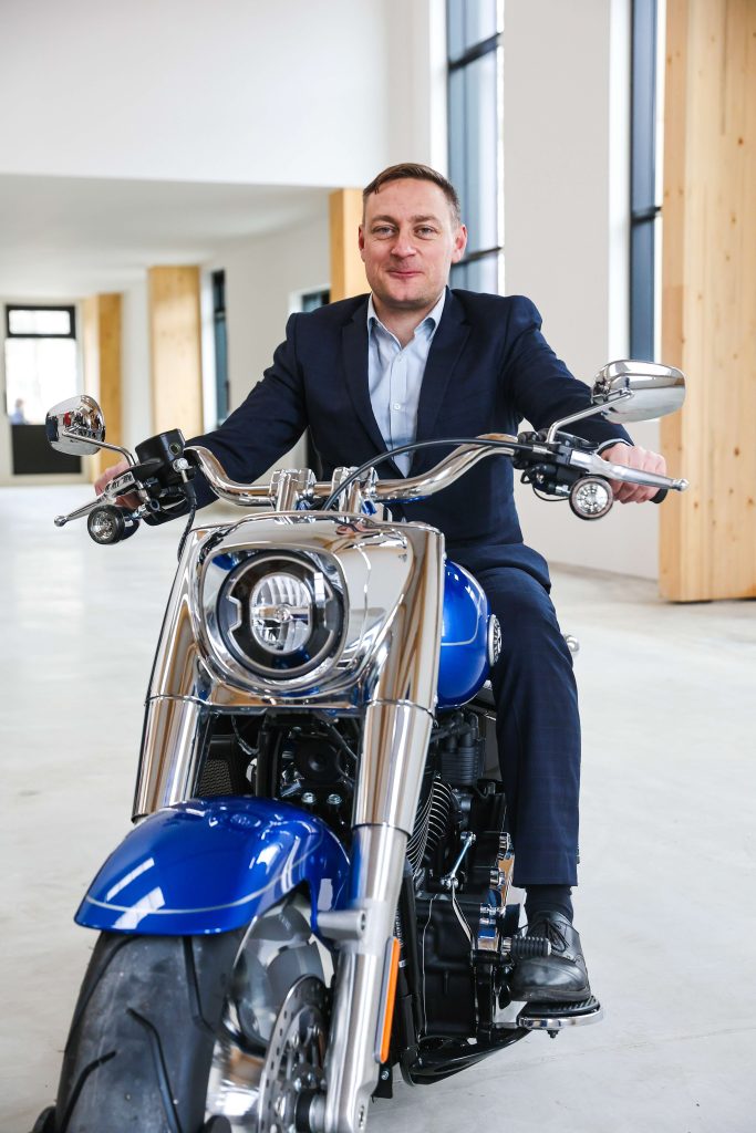 Olly Glover MP on a Harley Davidson