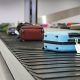 luggage on conveyor belt with tag