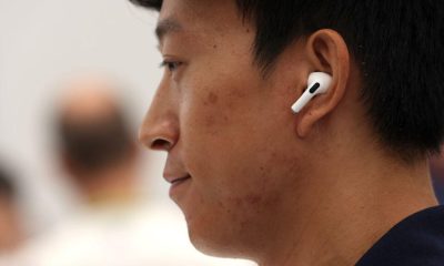 man wearing airpods gettyimages 1421695433