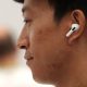 man wearing airpods gettyimages 1421695433