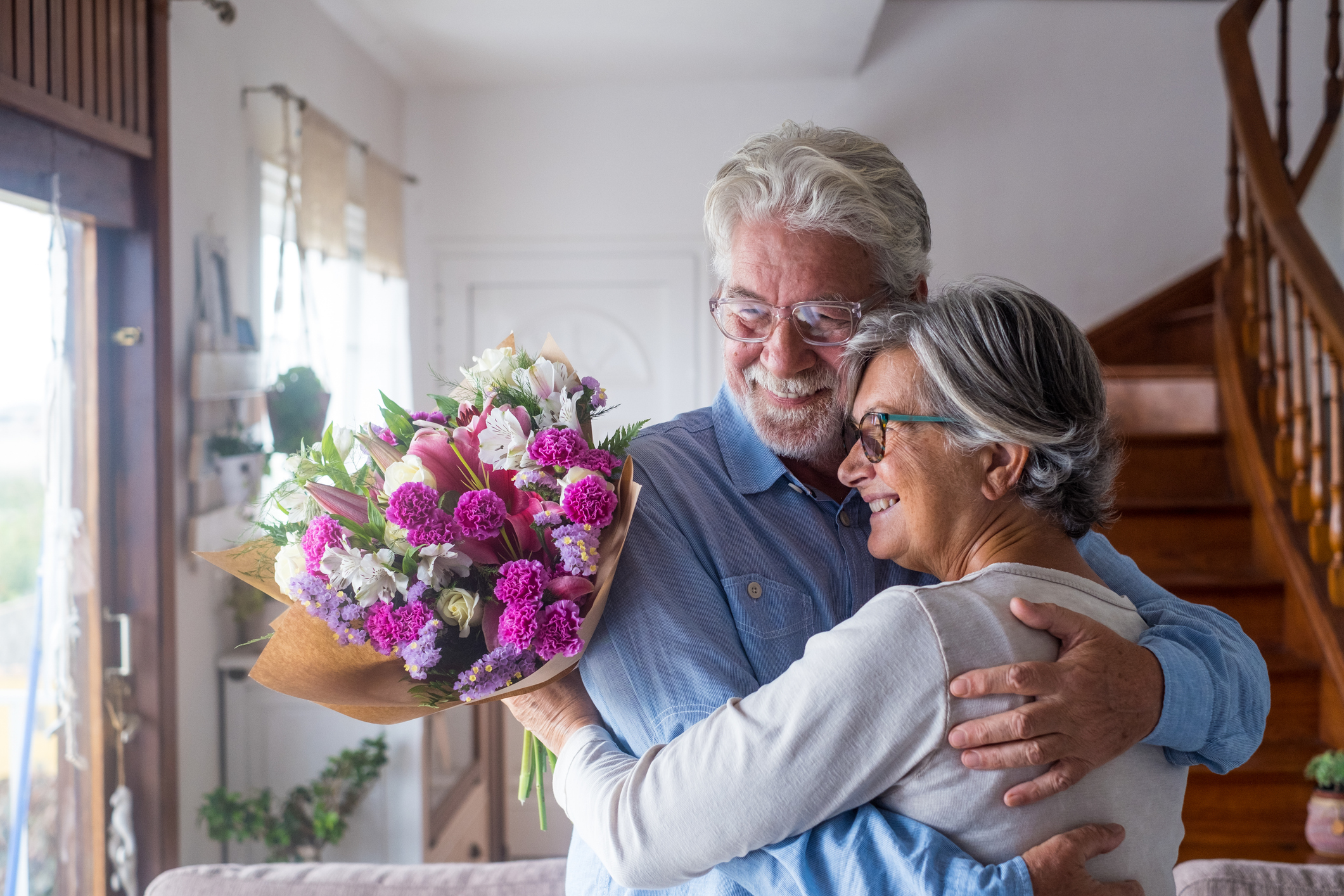 older couple embrace