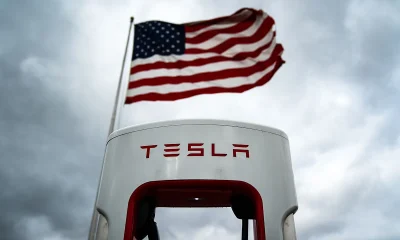 tesla charger with flag